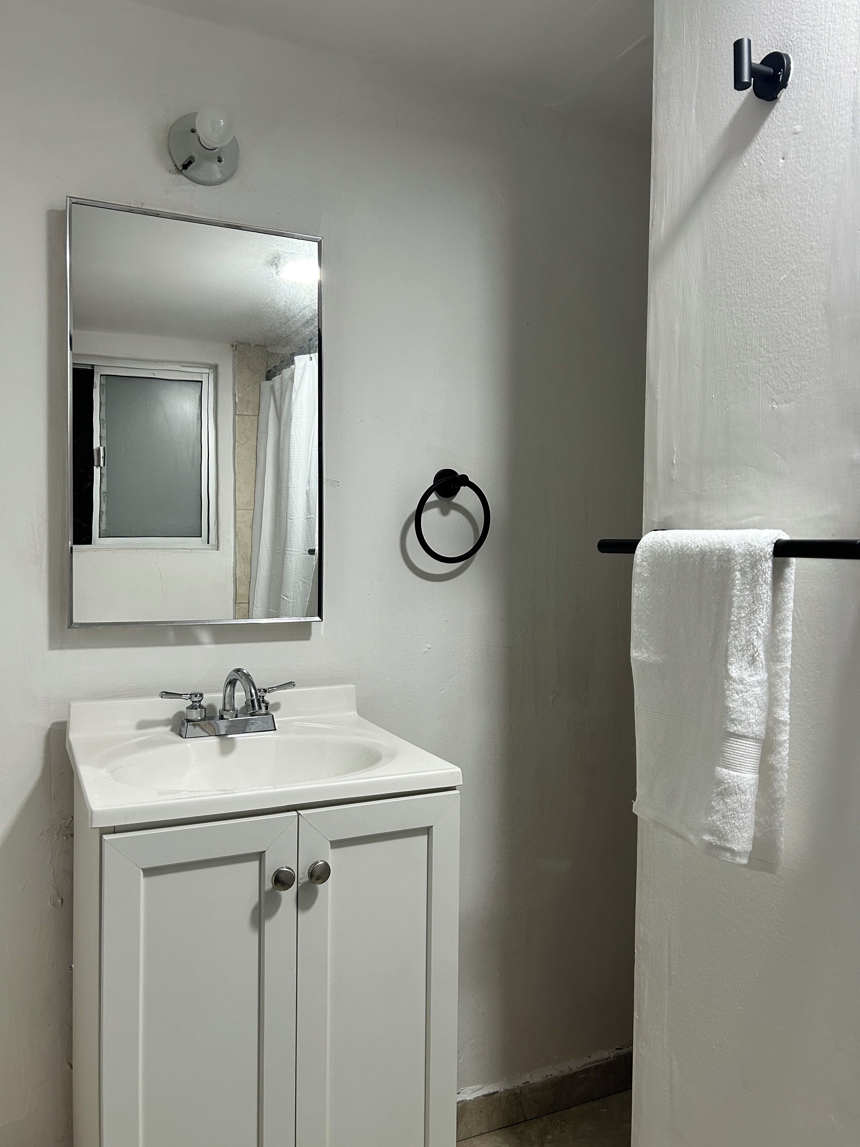 Shower, towels, soap, toilet paper