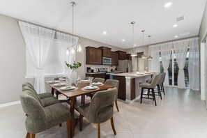 Dining - Incredible NEW 5BD Home All suites with Pool and BBQ Grill! (Clermont)