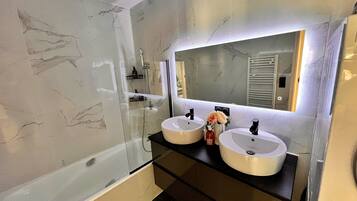 Hair dryer, towels, soap, shampoo
