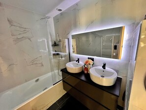 Hair dryer, towels, soap, shampoo