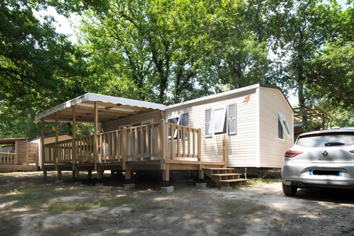 Mobile Home 'Mobilhome Confort 4 Personnes 61' with Private Terrace, Private Garden and Wi-Fi