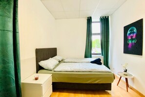 1 habitación y ropa de cama