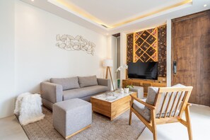 Standard Villa, 4 Bedrooms | Living room | Flat-screen TV
