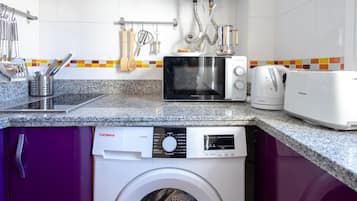 Fridge, microwave, coffee/tea maker, toaster