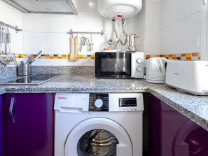 Fridge, microwave, coffee/tea maker, toaster