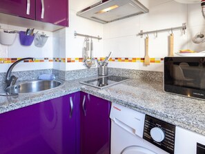 Fridge, microwave, coffee/tea maker, toaster