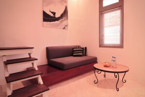 Toetasjesleilighet – deluxe | Oppholdsområde | TV