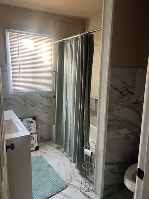 Hair dryer, towels, soap, shampoo