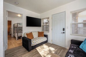 2 bedrooms, desk, iron/ironing board, travel crib