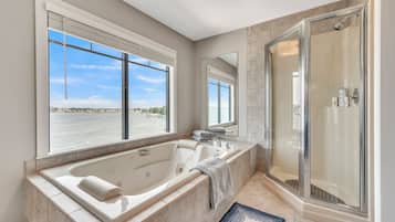 Shower, jetted tub, hair dryer, towels