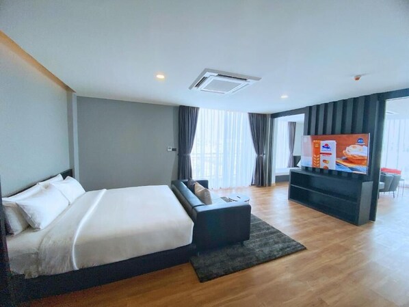 Luxury Suite, City View | In-room safe, desk, laptop workspace, free WiFi