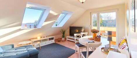 Télévision, table de tennis de table, chaîne hi-fi