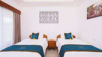 A hotel room with two beds, a nightstand, a painting, and a window with curtains.