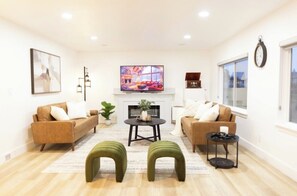 Smart TV, fireplace, books
