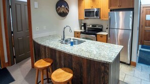 Fridge, microwave, dishwasher, coffee/tea maker