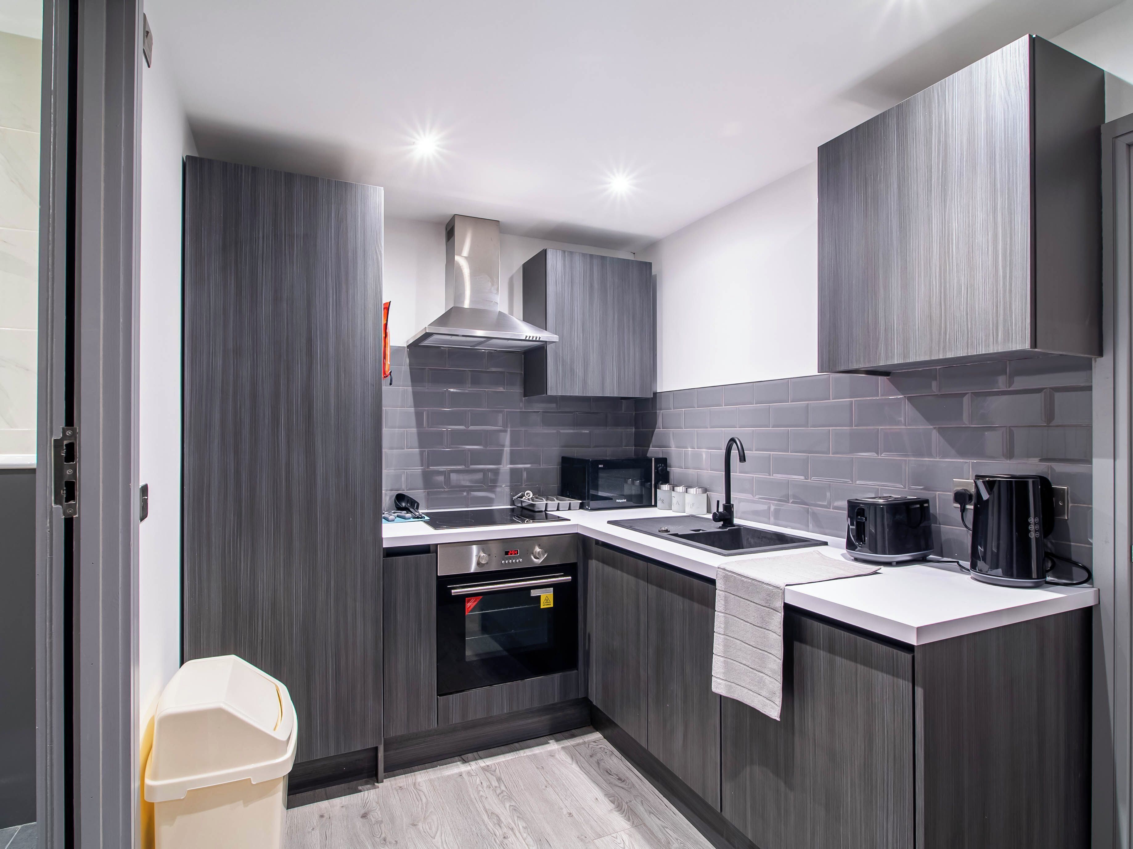 Apartment | Private kitchen | Fridge, microwave, oven, stovetop