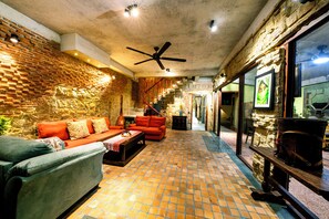 Comfort Villa, 3 Bedrooms, Kitchen, Garden View | Living area - La Rocca An Bang beach (Da Nang)