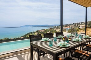 Outdoor dining - Mystique villa with sea view and private pool (LOURDATA)