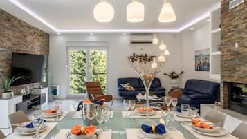 Villa (Four Bedroom Villa with Pool) | Living room | 32-inch flat-screen TV with digital channels