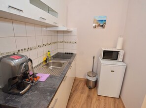 Studio (Studio Apartment) | Eget kjøkken | Kjøleskap