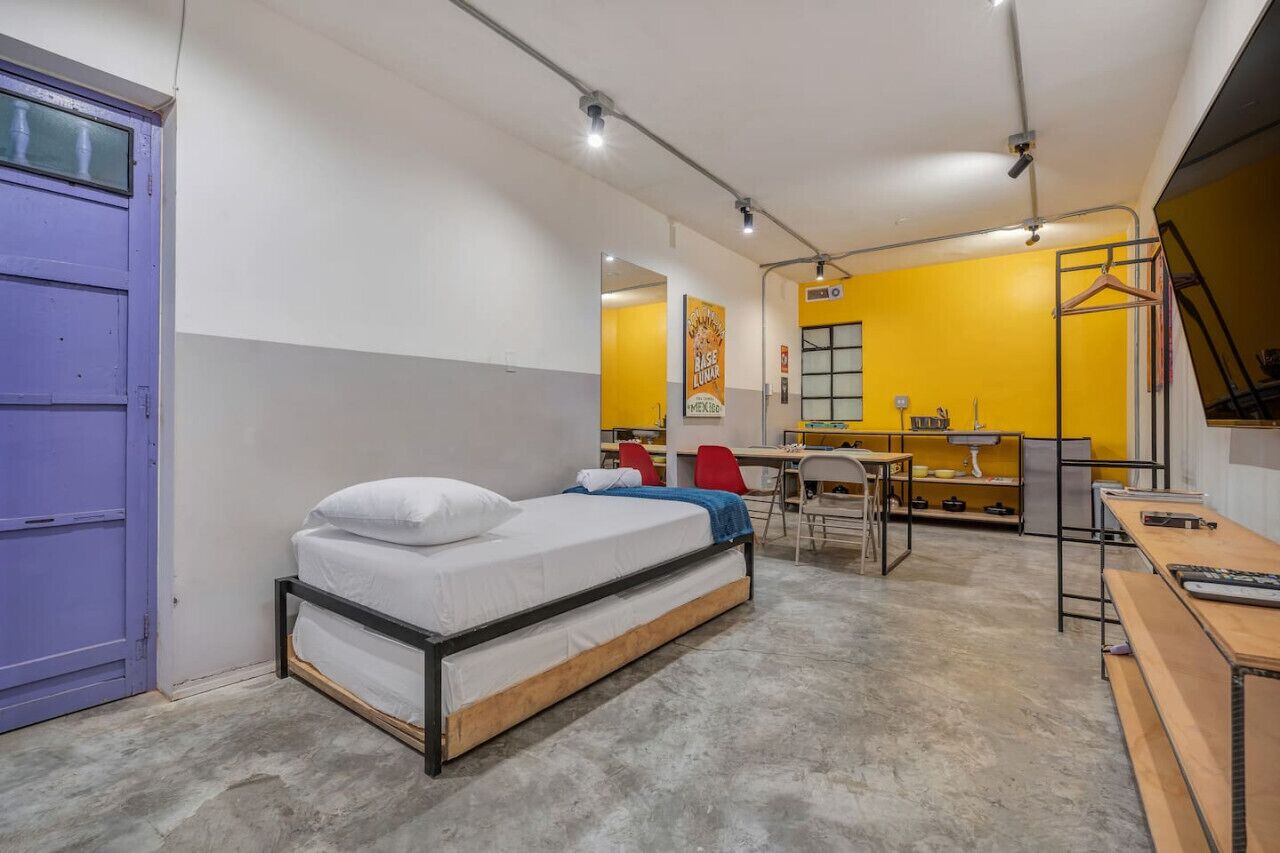 1 bedroom, desk, iron/ironing board, travel crib