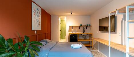 1 bedroom, desk, iron/ironing board, travel crib