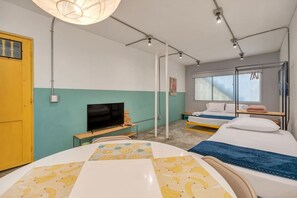 1 bedroom, desk, iron/ironing board, travel crib