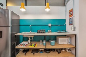 Microwave, oven, coffee/tea maker, cookware/dishes/utensils