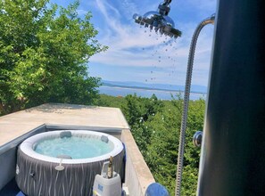 A hot tub with a view of the sea and mountains. - Serene Crikvenica Holiday Home With Hot Tub (Crikvenica)