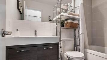 Hair dryer, towels, soap, toilet paper