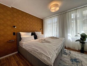 2 habitaciones, tabla de planchar con plancha, wifi y ropa de cama 
