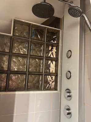 Shower, eco-friendly toiletries, hair dryer, towels