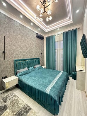 Family Condo, Balcony, City View | 1 bedroom, blackout drapes, iron/ironing board, free WiFi