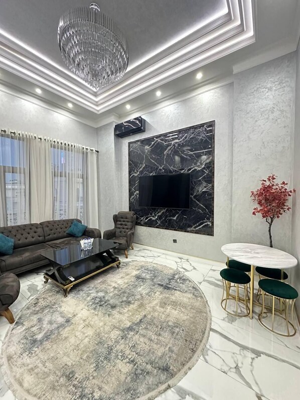 Family Condo, Balcony, City View | Living area