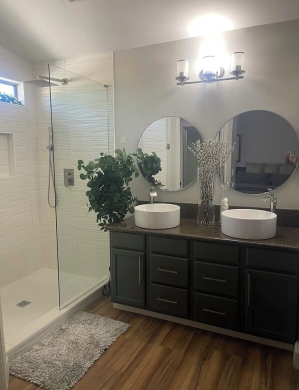 Shower, hair dryer, towels, toilet paper