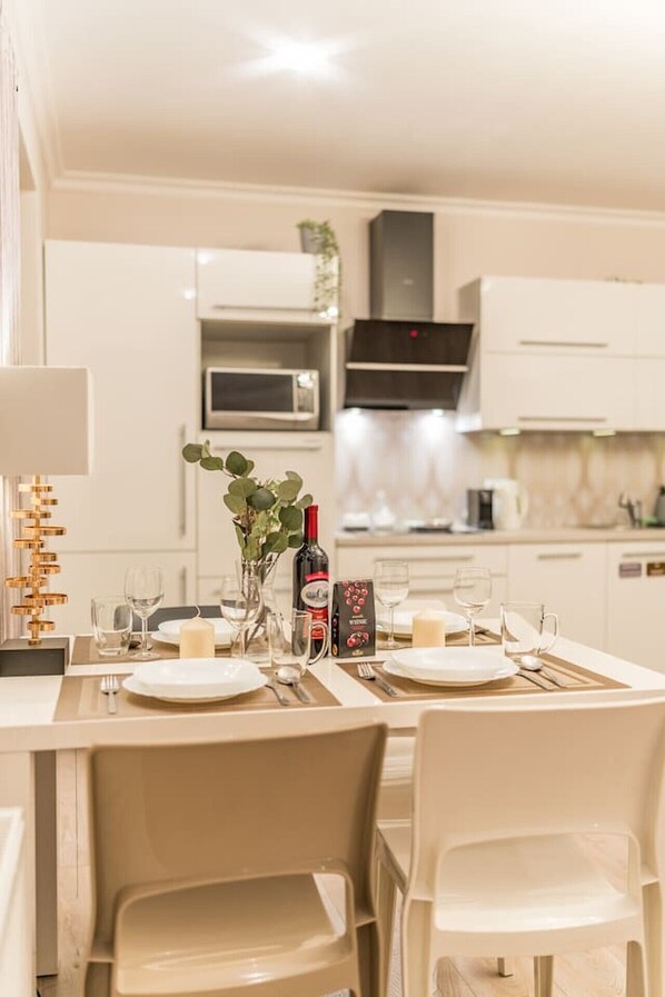 Fridge, microwave, stovetop, coffee/tea maker