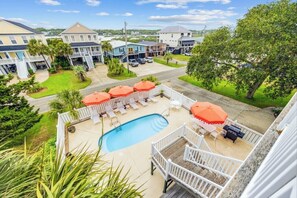 Outdoor pool, a heated pool - Spacious 3rd Row Beach House with a Heated Pool & Hot Tub (Murrells Inlet)