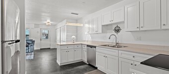 Silverstrike Condos Spacious with Covered Porch and Central Walkable Location.