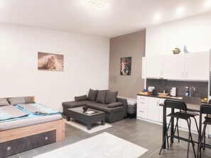 1 habitación, tabla de planchar con plancha, wifi y ropa de cama 