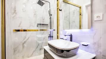 Family Condo, City View | Bathroom | Free toiletries, slippers