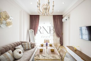 Family Condo, City View | 1 bedroom, blackout drapes, iron/ironing board, free WiFi