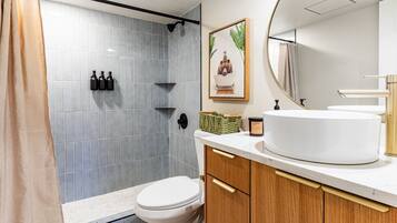 Shower, towels, soap, toilet paper