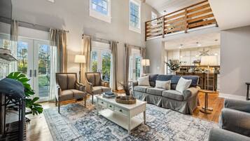 Télévision, cheminée, baby-foot