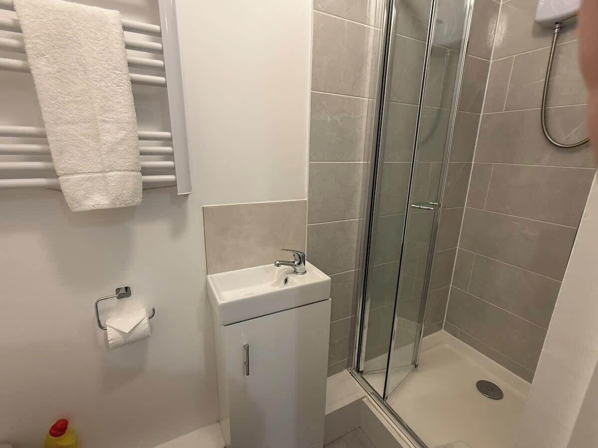 Shower, hair dryer, shampoo