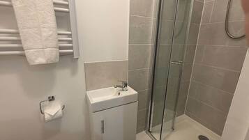 Shower, hair dryer, shampoo