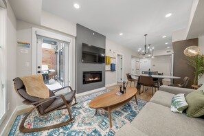 Smart TV, fireplace, books