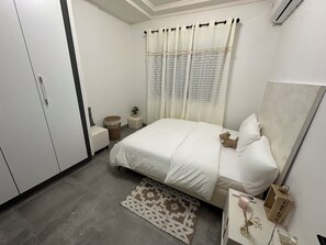 2 habitaciones, tabla de planchar con plancha, wifi y ropa de cama 