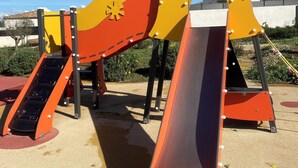 A playground with a slide and climbing structures. - Villa relaxation (Narbonne)