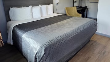 Chambre simple, 1 très grand lit, non-fumeur | Bureau, accès au Wi-Fi (inclus), literie fournie