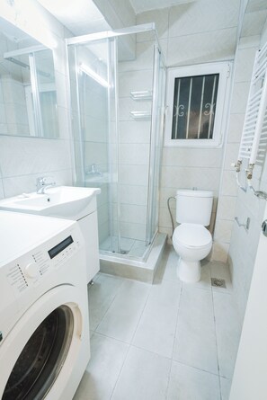 Hair dryer, towels, shampoo